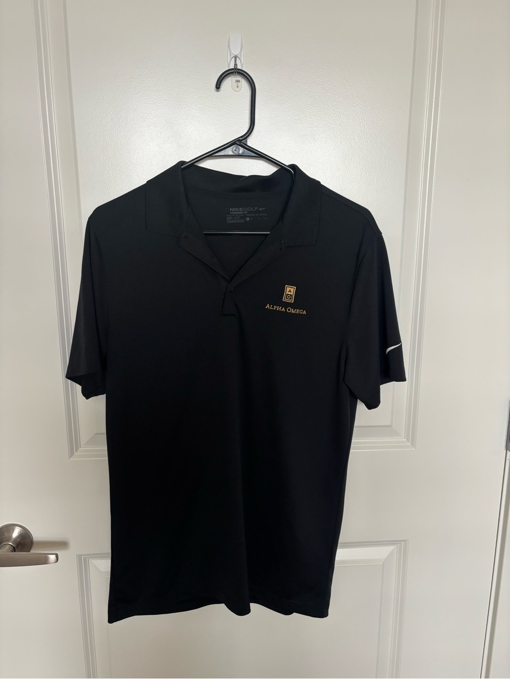 Nike Black Polo with Gold Alpha Omega Winery Patch